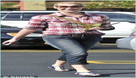 Katherine Heigl steps out in ripped jeans and check shirt